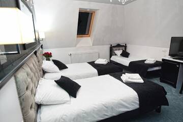 Фото номера Трехместный номер Делюкс Мини-отель Hotel Campari г. Góra Motyczna 4